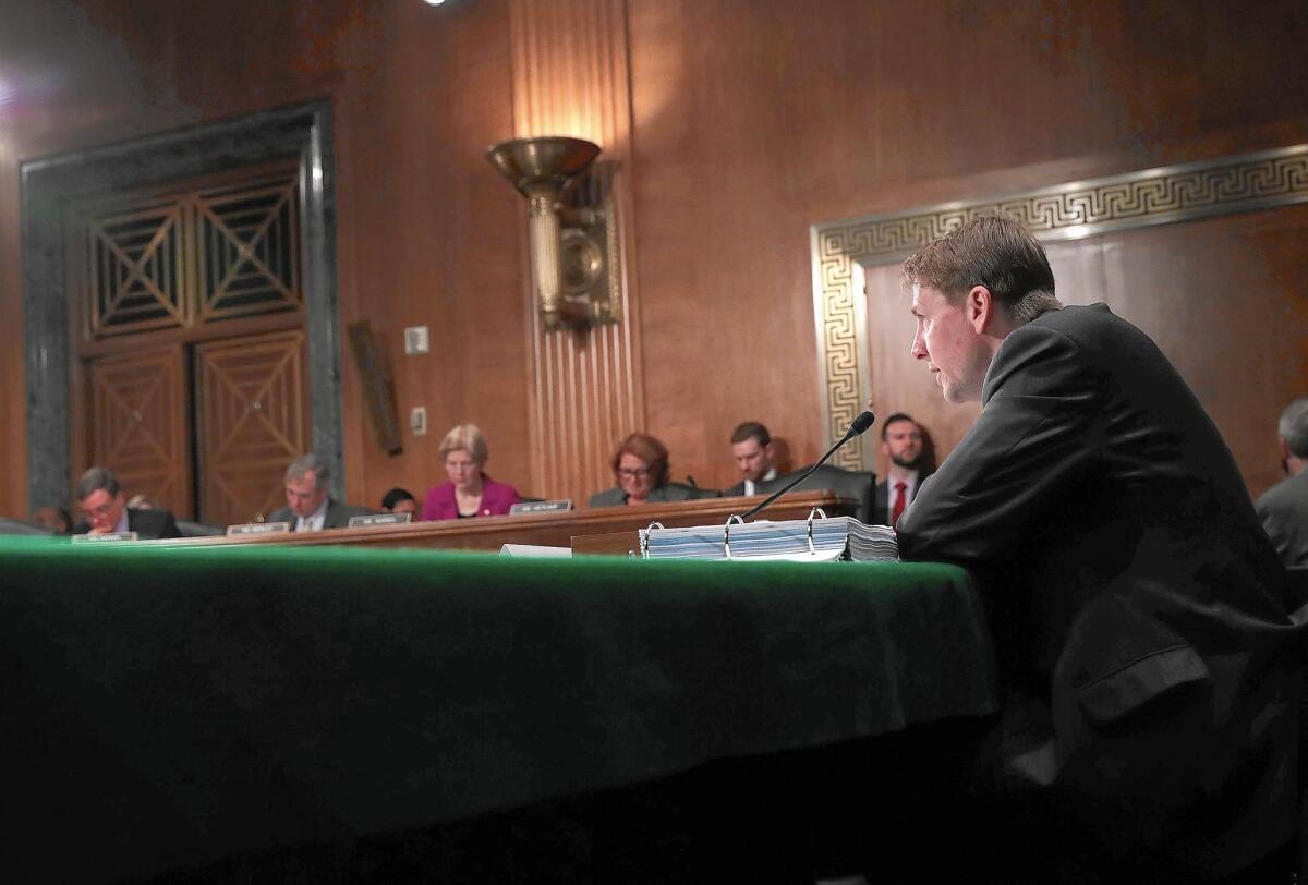 Richard Cordray, director of the Consumer Financial Protection Bureau, testifies at a Senate hearing last month. Class-action bans deny “consumers the right to seek justice and relief for wrongdoing,” he says.