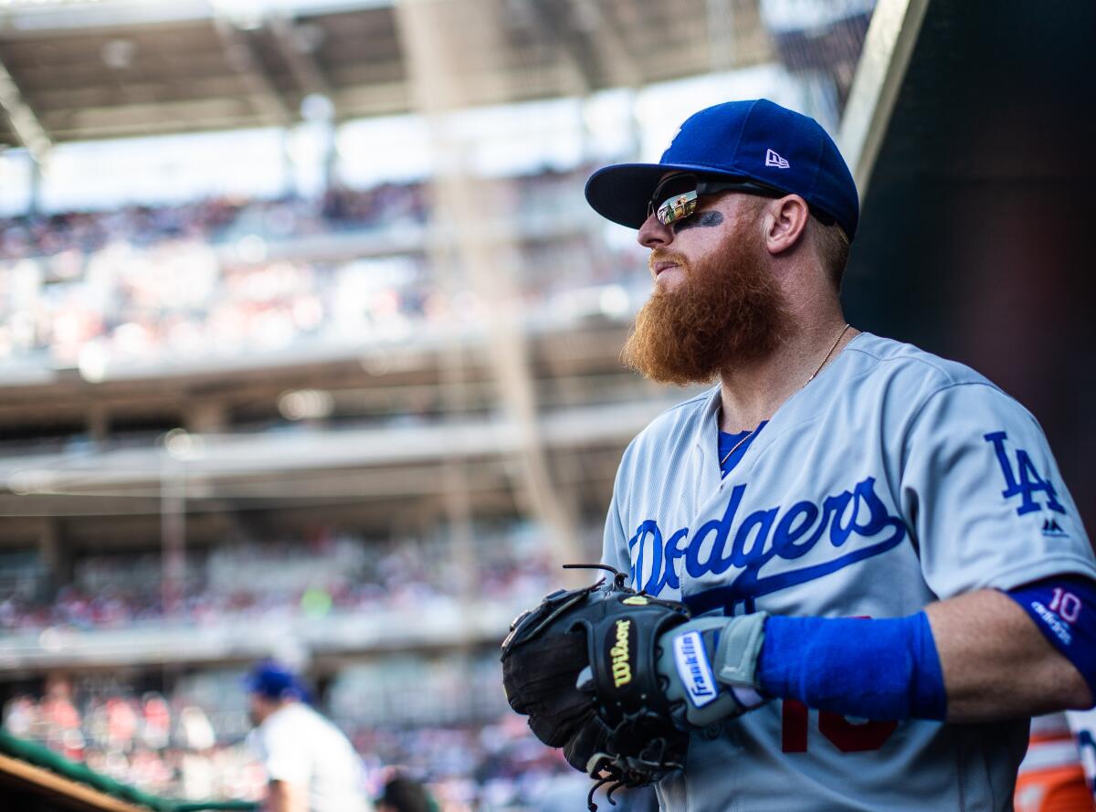 Dodgers third baseman Justin Turner missed his fourth game in a row Saturday because of a back ailment.
