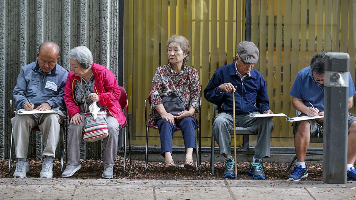 Voters wait to vote at Pio Pico Library in Koreatown for the special election to replace Xavier Becerra in the 34th Congressional District.