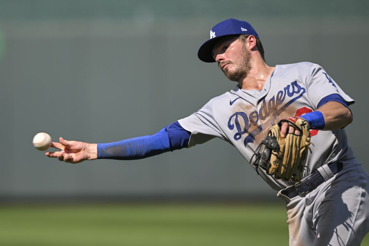 Dodgers second baseman Gavin Lux throws for first in a game against the Kansas City Royals in August.
