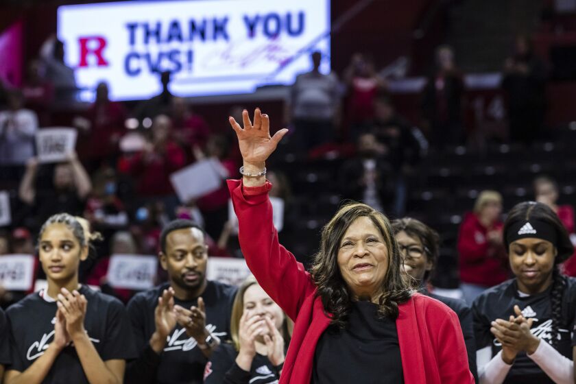 Former Rutgers head coach, C. Vivian Stringer, is honored at a ceremony during half time at the Big Ten Conference women's college basketball game between the Rutgers Scarlet Knights and the Ohio State Buckeyes in Piscataway, N.J., Sunday, Dec. 4, 2022. (AP Photo/Stefan Jeremiah)