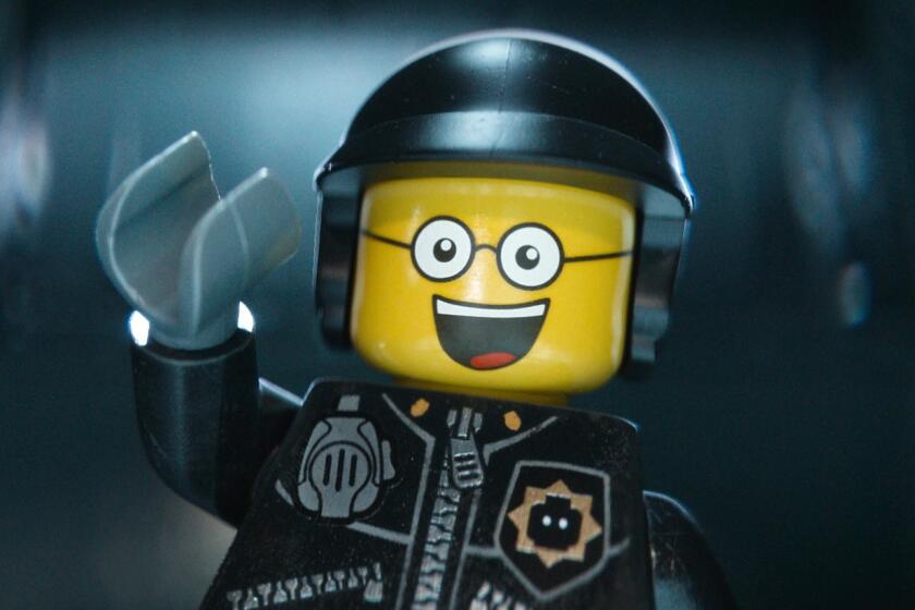 Bad Cop/Good Cop, voiced by Liam Neeson, in a scene from "The Lego Movie."