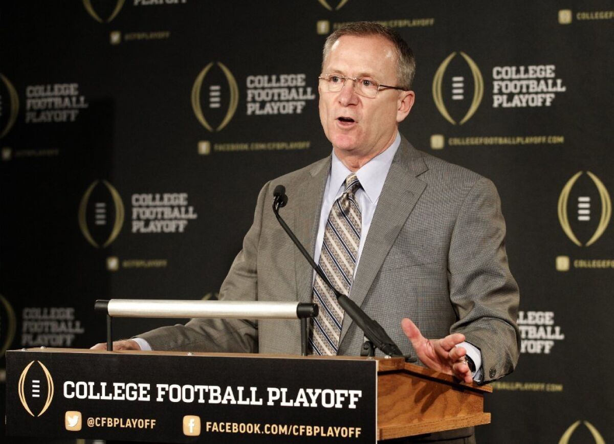 Jeff Long is the chairman of the 13-member college football playoff committee.