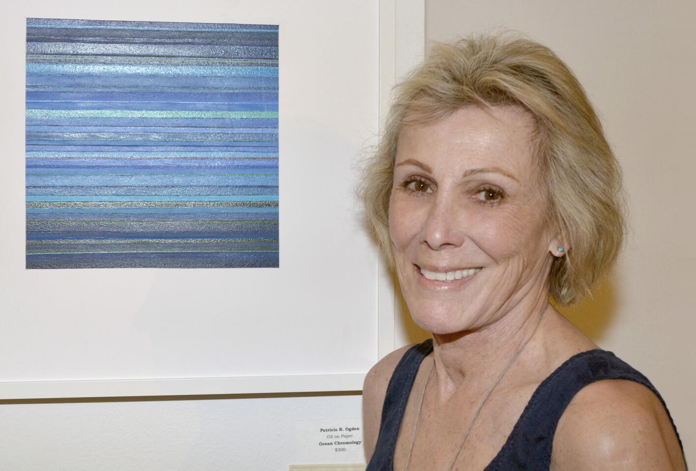 Patricia Ogdon's oil on paper presentation of "Ocean Chromology" took second place honors at Friday's opening night reception of "Hot & Cold."