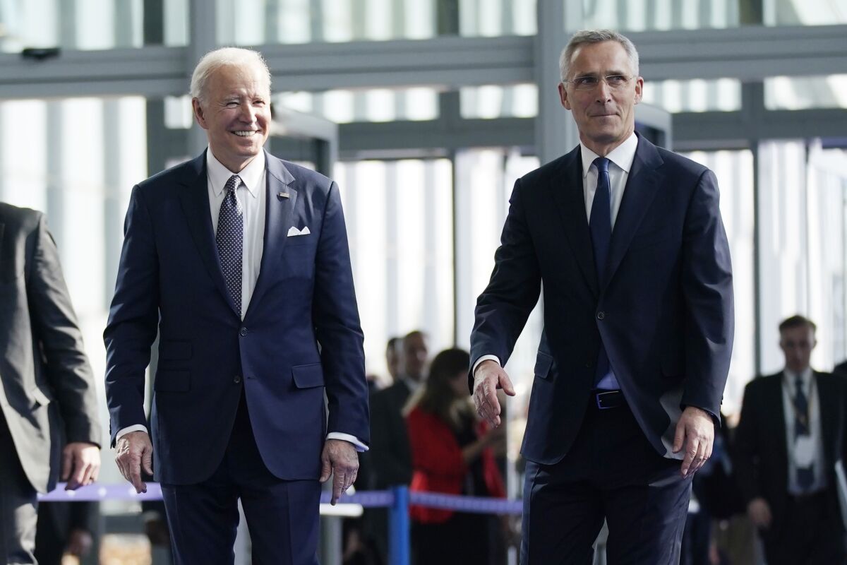 FILE - President Joe Biden is greeted by NATO Secretary General Jens Stoltenberg as he arrives for meetings with NATO allies about the Russian invasion of Ukraine, on March 24, 2022, in Brussels. Finland appears on the cusp of joining NATO. Sweden could follow suit. By year's end, they could stand among the alliance's ranks. Russia's war in Ukraine has provoked a public about face on membership in the two Nordic countries. They are already NATO's closest partners, but should Russia respond to their membership moves they might soon need the organization's military support. (AP Photo/Evan Vucci, File)