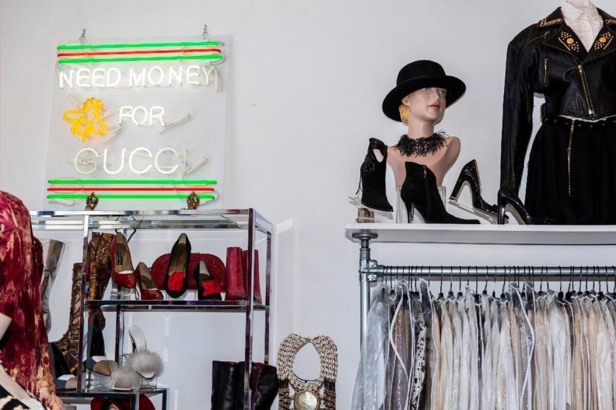 The neon "Need Money for Gucci" sign caught the attention of artist Trevor Andrew, known professionally as Gucci Ghost. "I was blown away by the amount of knowledge and depth of their collection,” he says. “It’s a museum.”