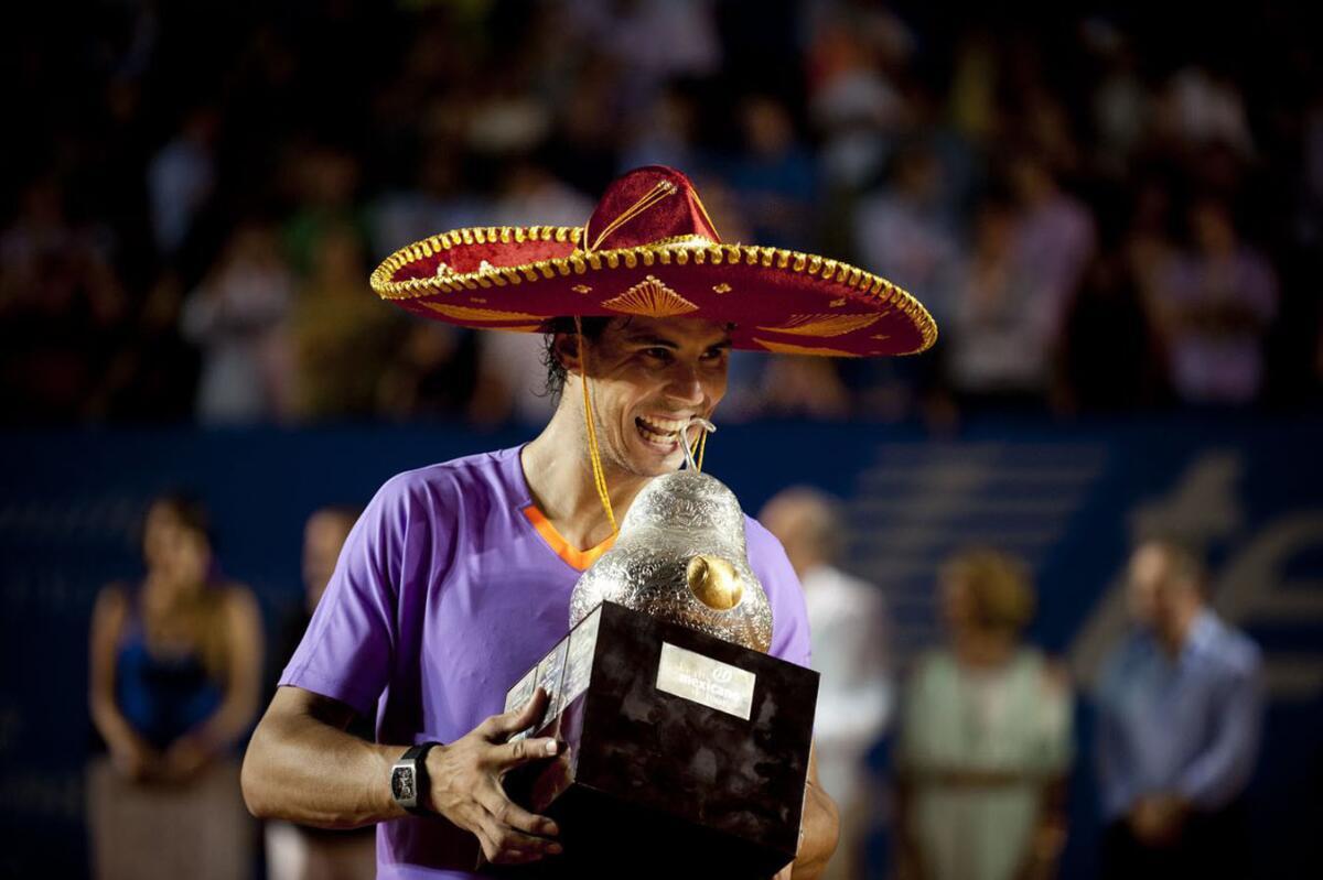 Rafael Nadal celebra tras coronarse en el Abierto Mexicano 2013.