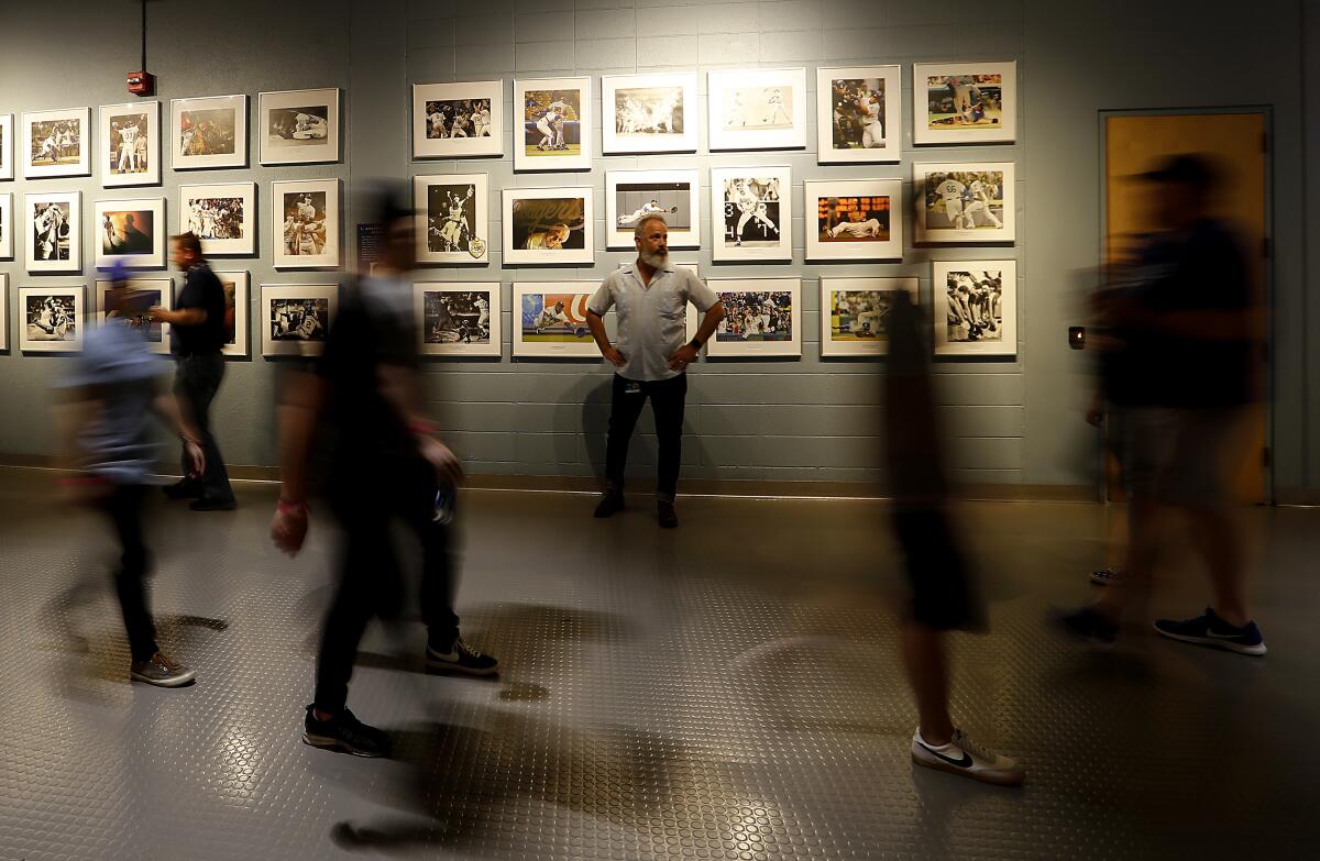 Photographs of the Dodgers past and present hang on the walls of Dodger Stadium in Los Angeles.