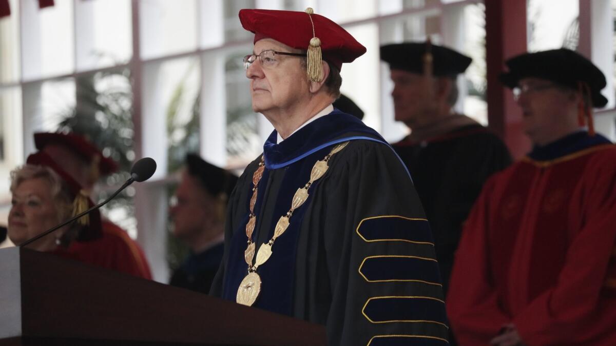 USC President C.L. Max Nikias at a commencement ceremony on campus May 11. The university's Board of Trustees said late Friday that it would begin "an orderly transition commence the process of selecting a new president."
