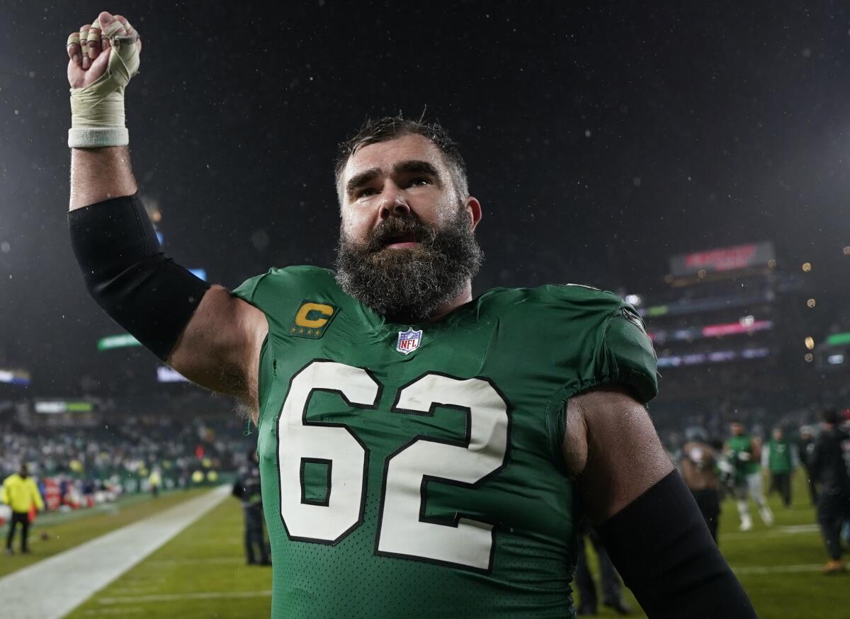 Eagles center Jason Kelce raises his fist while leaving the field after a game in Philadelphia in November.