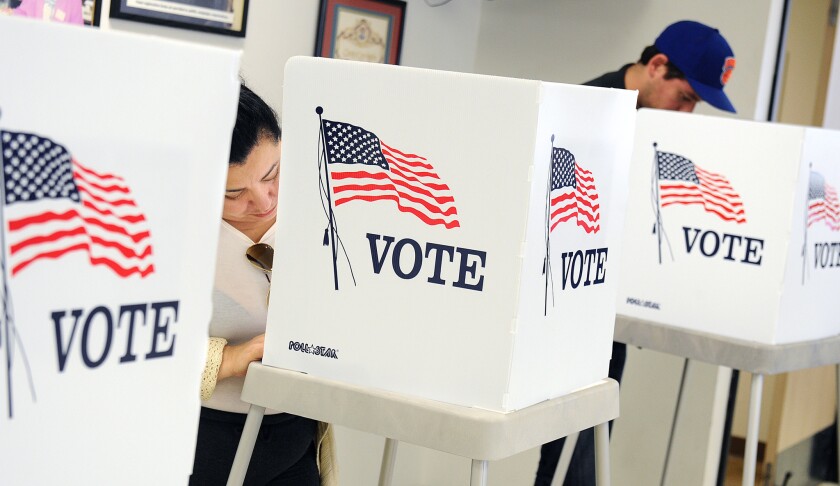 Voters make selections on Nov. 3, 2014, in Norwalk.