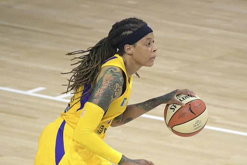Los Angeles Sparks guard Seimone Augustus (33) brings the ball up the court during the first half of a WNBA basketball game against the Phoenix Mercury, Saturday, July 25, 2020, in Bradenton, Fla. (AP Photo/Phelan M. Ebenhack)