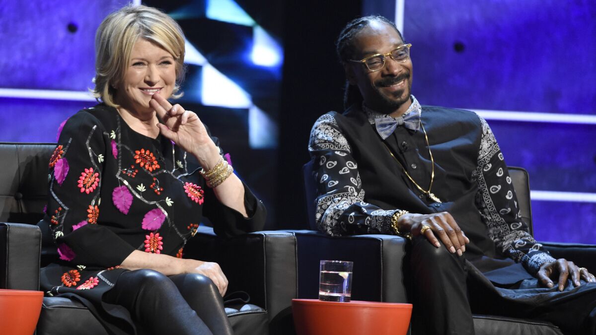 Martha Stewart and Snoop Dogg at the Comedy Central Roast of Justin Bieber. The two are hosting a new show on VHI called "Martha and Snoop's Potluck Dinner Party."
