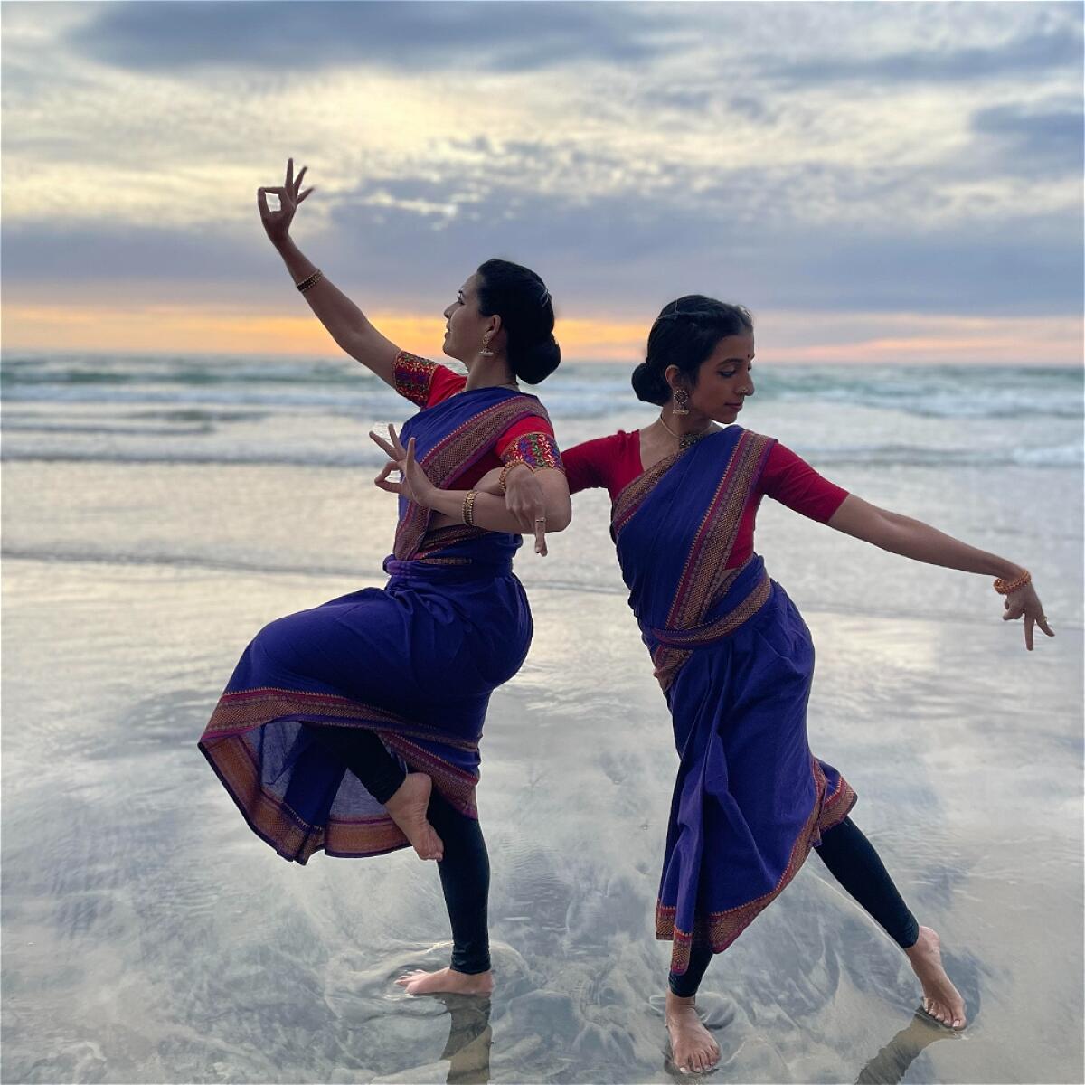 Bharantanatyam and Beyond Indian dancers in the ocean.