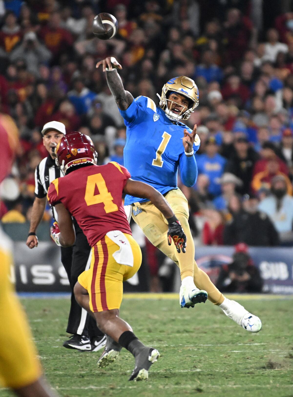 UCLA quarterback Dorian Thompson-Robinson throws a pass against USC in the fourth quarter Saturday.