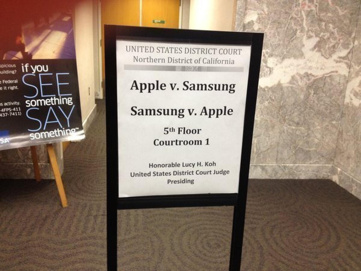 A sign directs jurors to the trial between Apple and Samsung in federal court in San Jose last month.