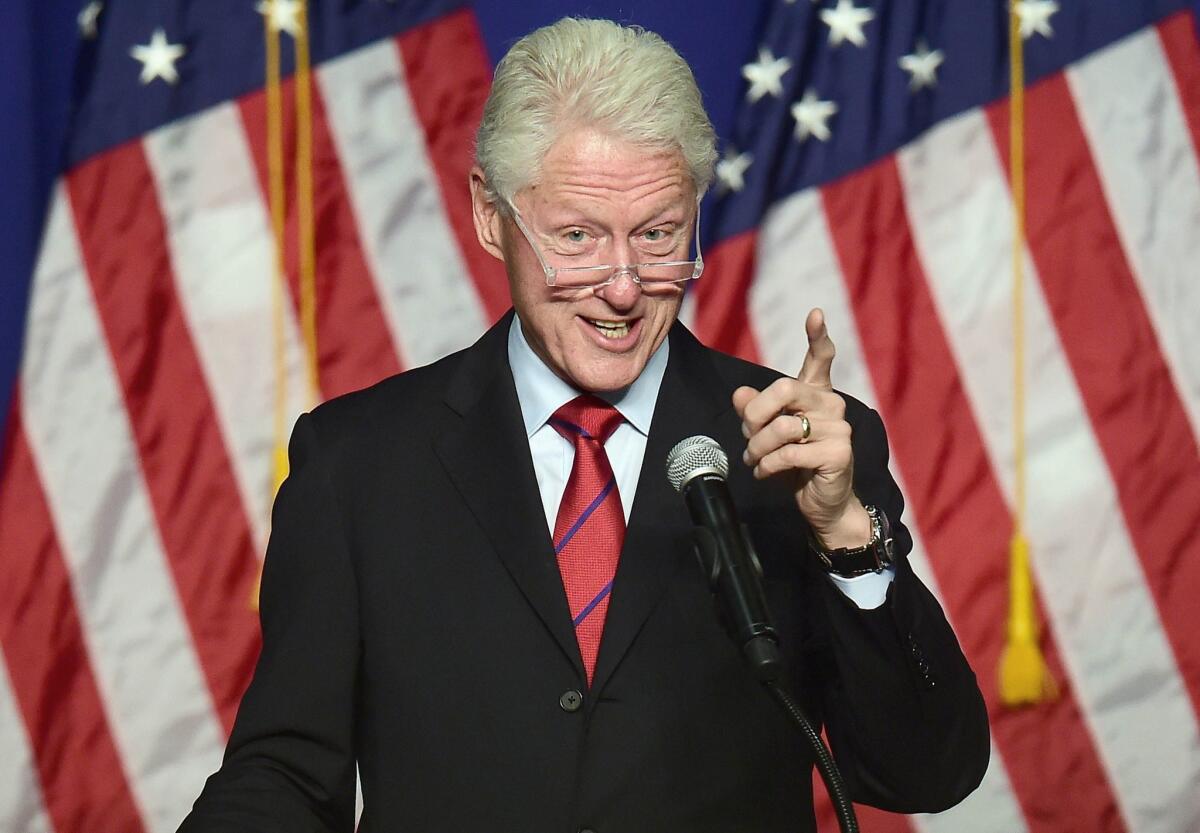 Bill Clinton speaks at a "Get Out The Vote" rally in Oxnard last October. The former president said in an interview in May that he will keep giving lucrative speeches "to pay our bills" while wife Hillary Clinton runs for the White House.