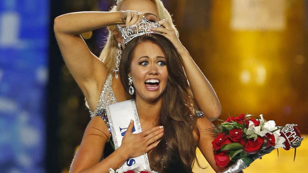 Miss North Dakota Cara Mund reacts after being named Miss America during the 2018 pageant in Atlantic City.