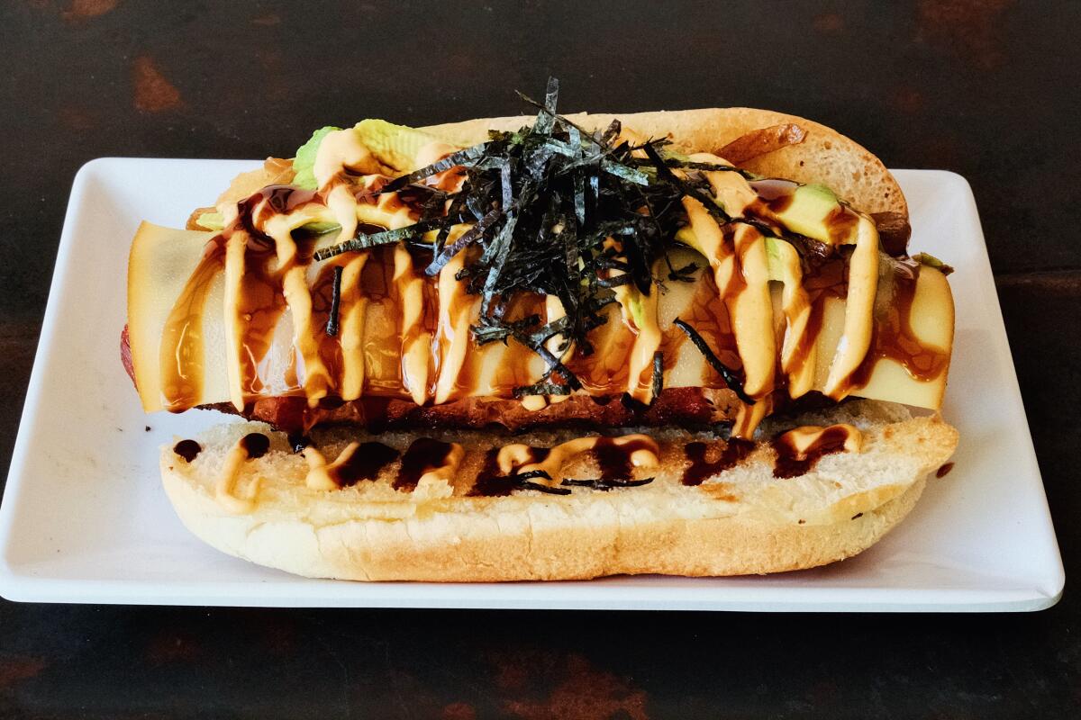 The Shohei Ohtani hot dog on a white rectangular plate from Little Tokyo Far Bar