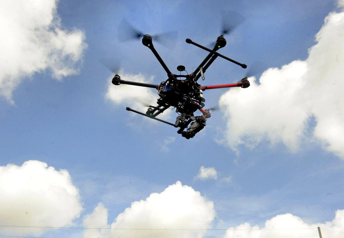 A hexa-copter belonging to owner Paul Charbonnet's BatonRouge company Amosphere Aerial is seen being used for aerial photography job.