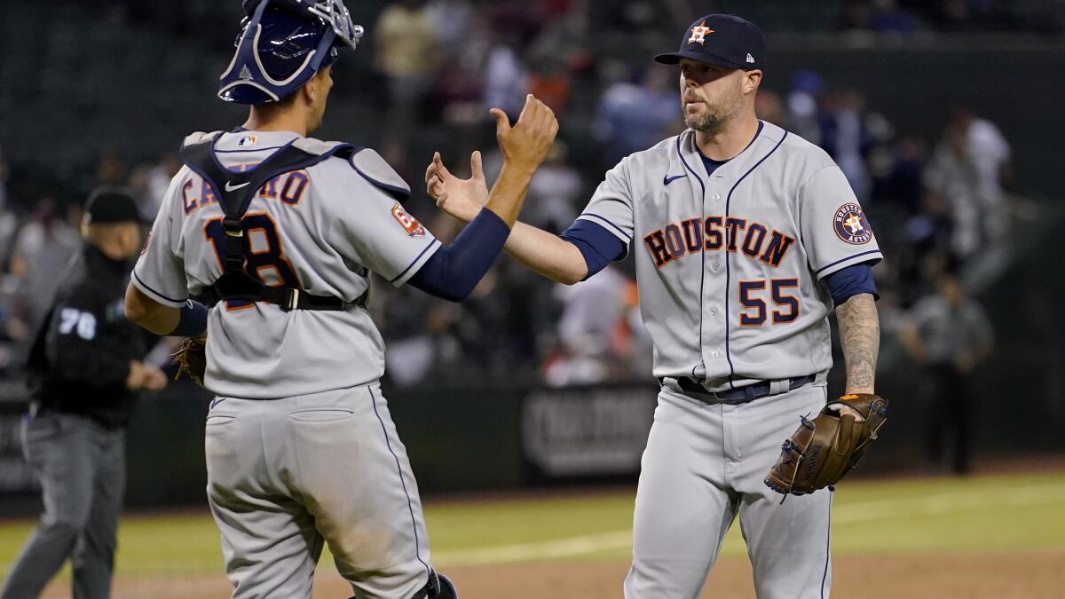 Astros' Ryan Pressly to remain on injured list