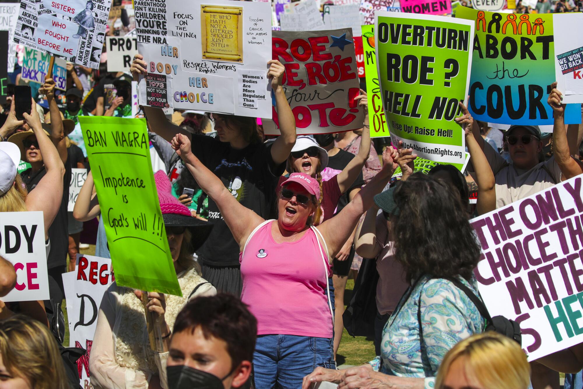 A packed crowd with signs at an abortion rights rally downtown in front of Los Angeles City Hall