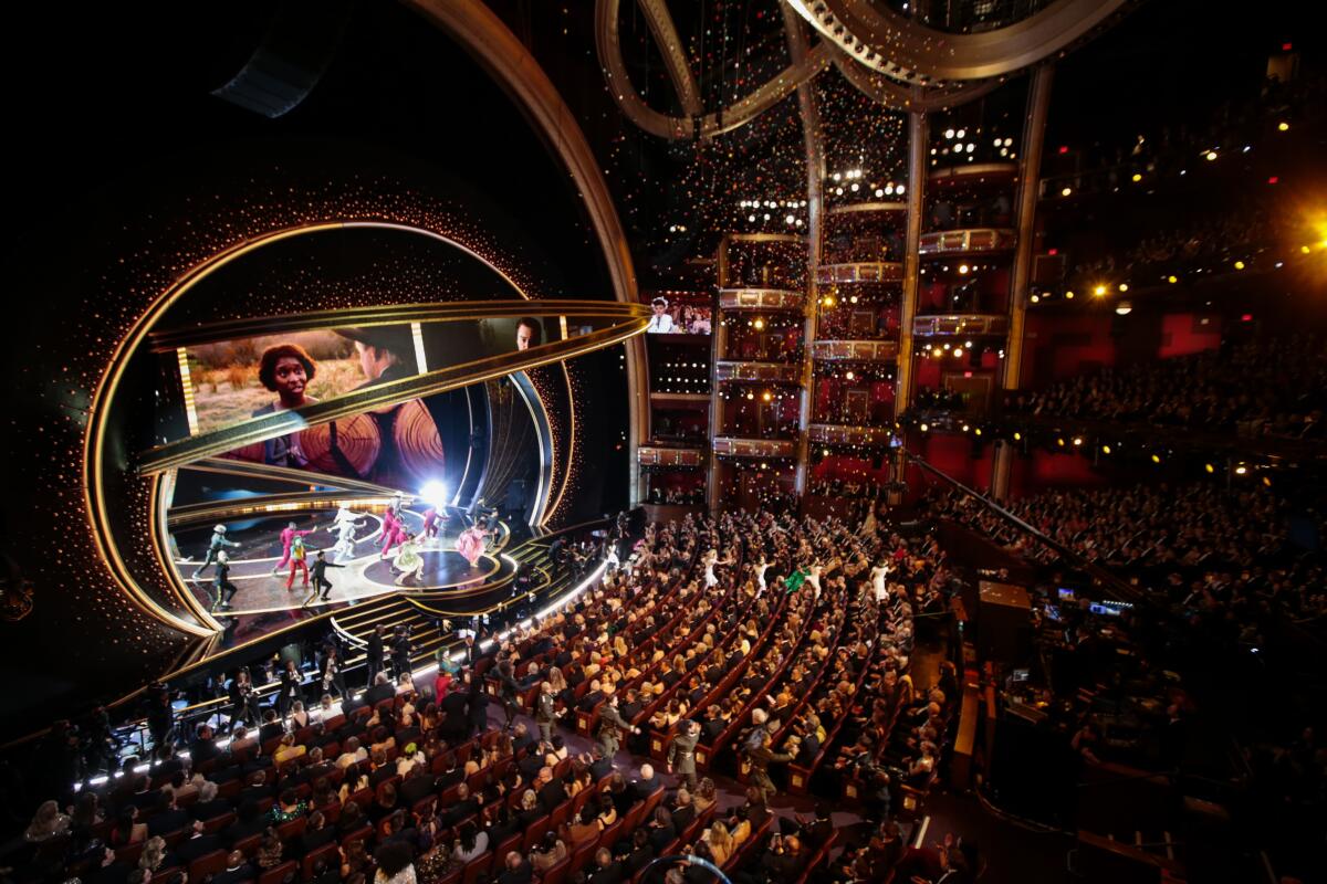 A view from above the audience of the Oscars, looking toward the Dolby Theatre stage.
