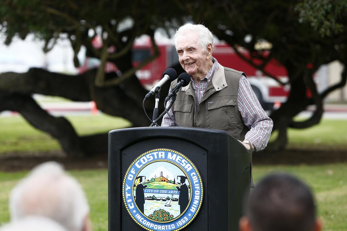 Former Costa Mesa police chief Roger Neth speaks at a dedication ceremony for Neth Park on Thursday morning in Costa Mesa.