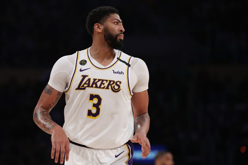 LOS ANGELES, CALIFORNIA - FEBRUARY 23: Anthony Davis #3 of the Los Angeles Lakers runs on the court during the game against the Boston Celtics at Staples Center on February 23, 2020 in Los Angeles, California. (Photo by Katelyn Mulcahy/Getty Images)