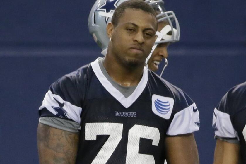 Defensive end Greg Hardy's suspension for conduct detrimental to the league has been reduced from 10 games to four games.