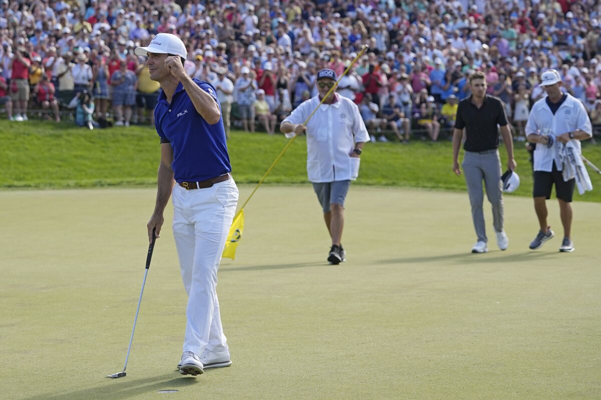 Billy Horschel celebrates on the 18th green after winning the Memorial in Dublin, Ohio, on Sunday.