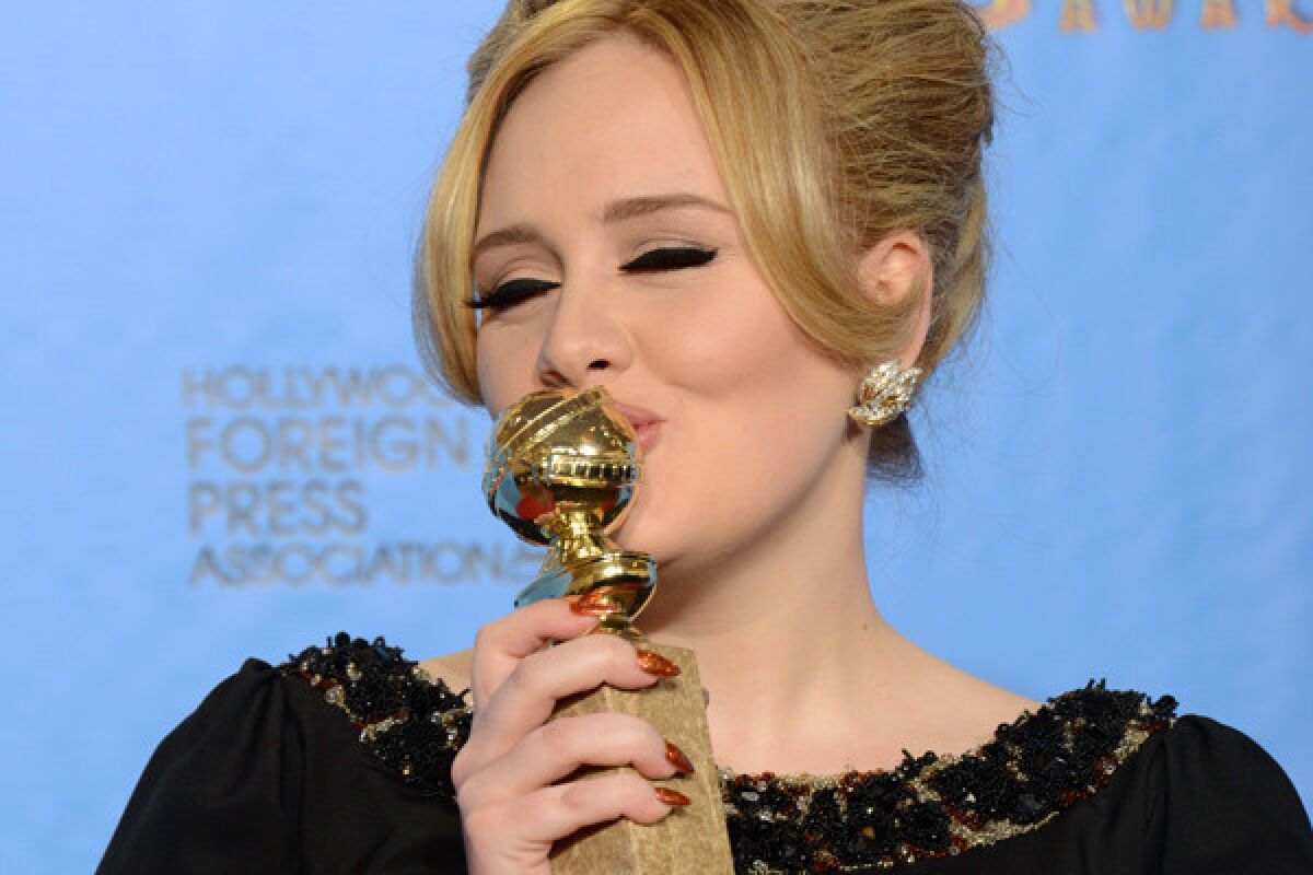 Adele, smooching her Golden Globe for "Skyfall" earlier this month, will be performing the tune -- also nominated for an Oscar -- at the Academy Awards telecast next month.