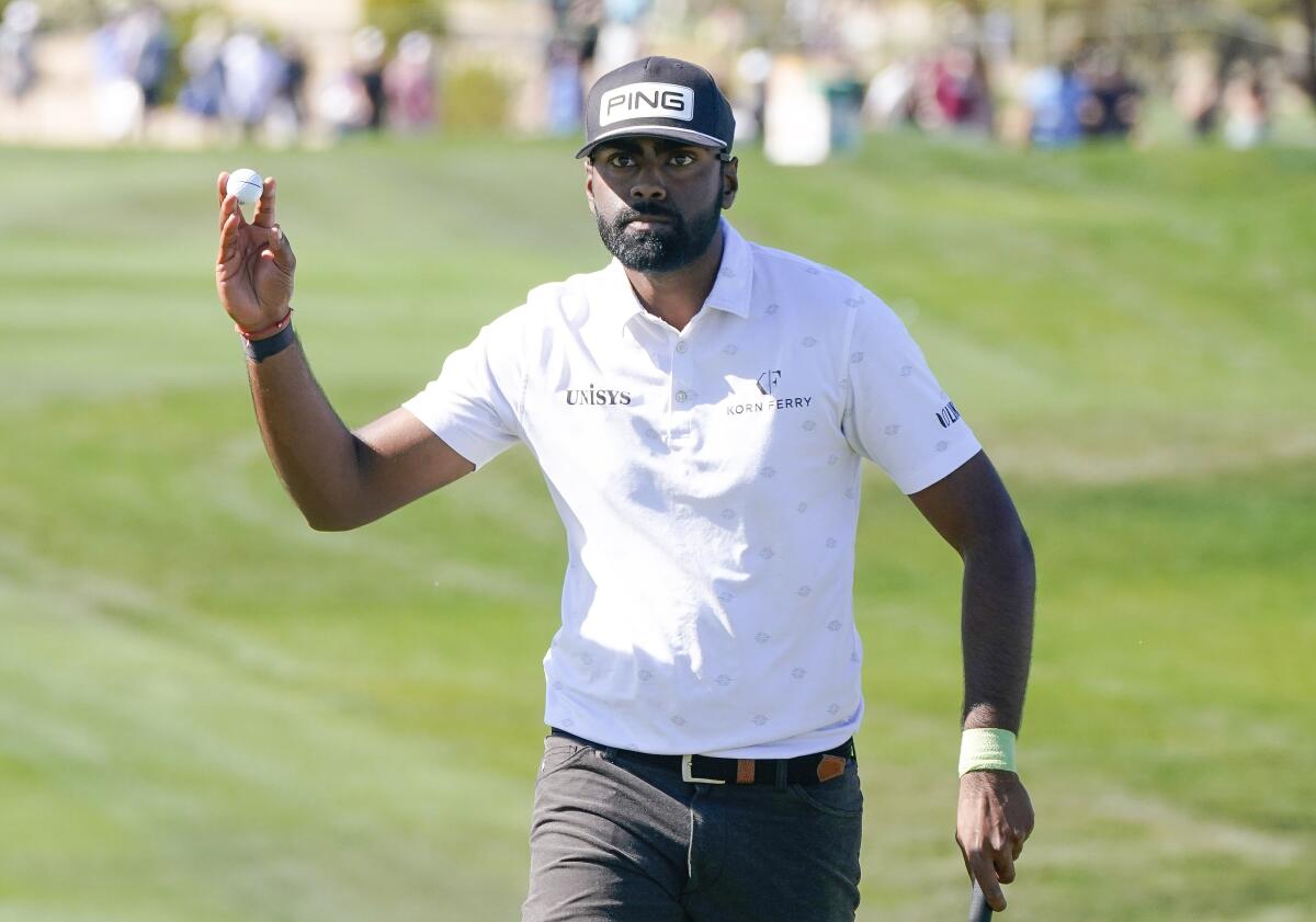 Sahith Theegala shot a two-under 69 in the third round of the Phoenix Open and leads by one stroke.