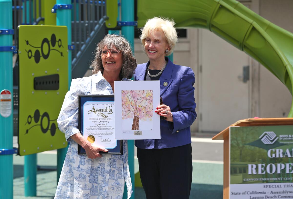 Assemblywoman Diane Dixon, right, presents Boys & Girls Club of Laguna Beach CEO Pamela Estes with a certificate on Friday.