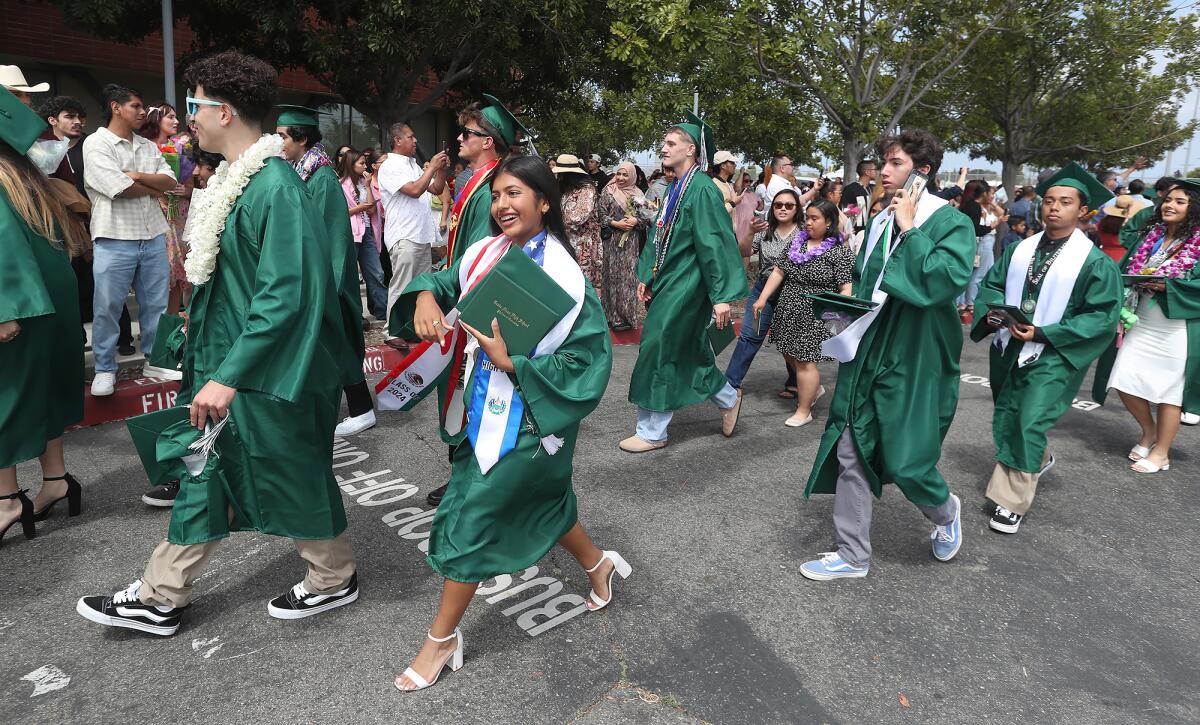 Graduates participate in the traditional "Walk up Arlington."