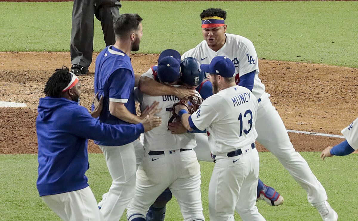 Dodgers players celebrate immediately after defeating the Tampa Bay Rays in Game 6 of the 2020 World Series.