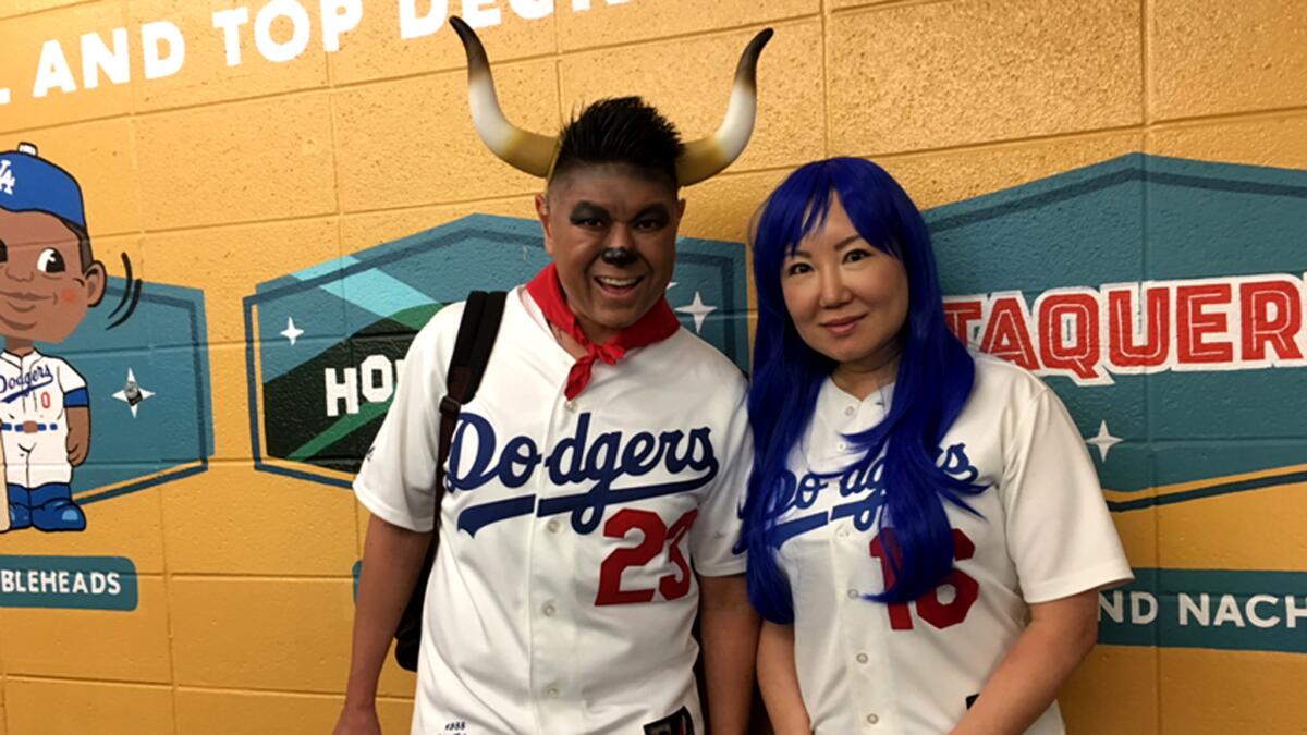 Robert Lee and Susan Kim were in elementary school when the Dodgers last played in the World Series.