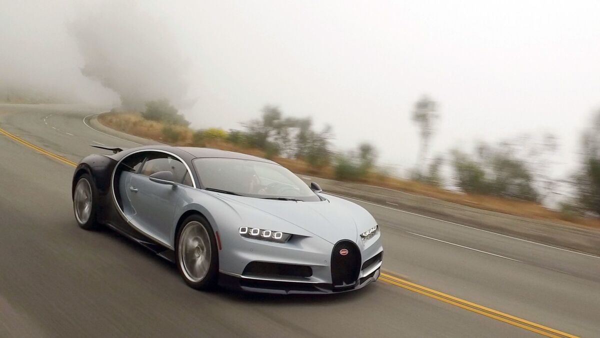 The Chiron is electronically limited to 236 miles per hour, but has a "speed key" that can raise that number to 260 mph. (Myung J. Chun / Los Angeles Times)