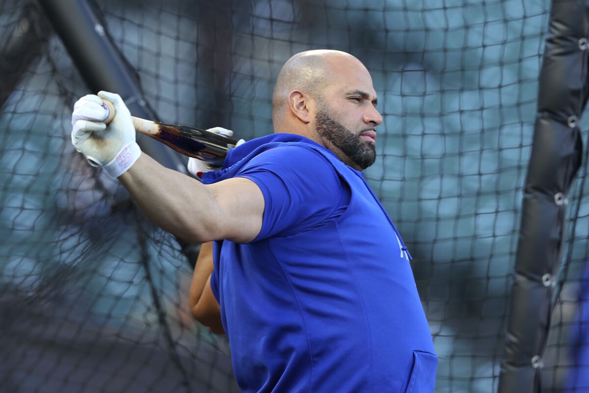Dodgers first baseman Albert Pujols warms up before Game 5 of the NLDS against the San Francisco Giants in October.