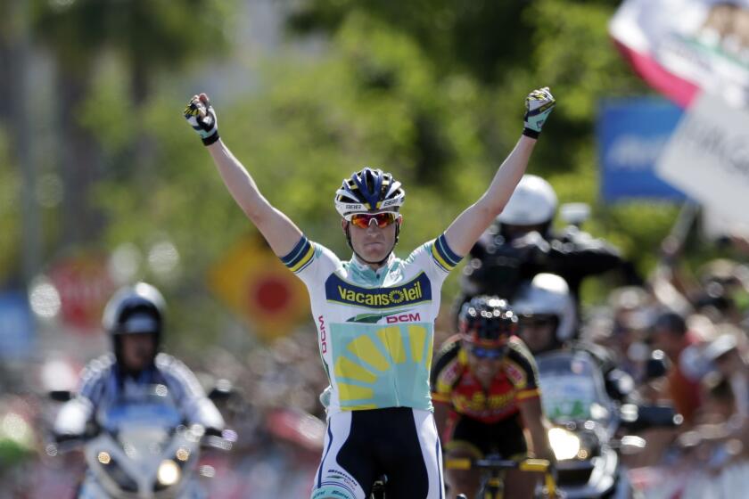 Lieuwe Westra raises his arms after winning the first stage of the Tour of California cycling race.