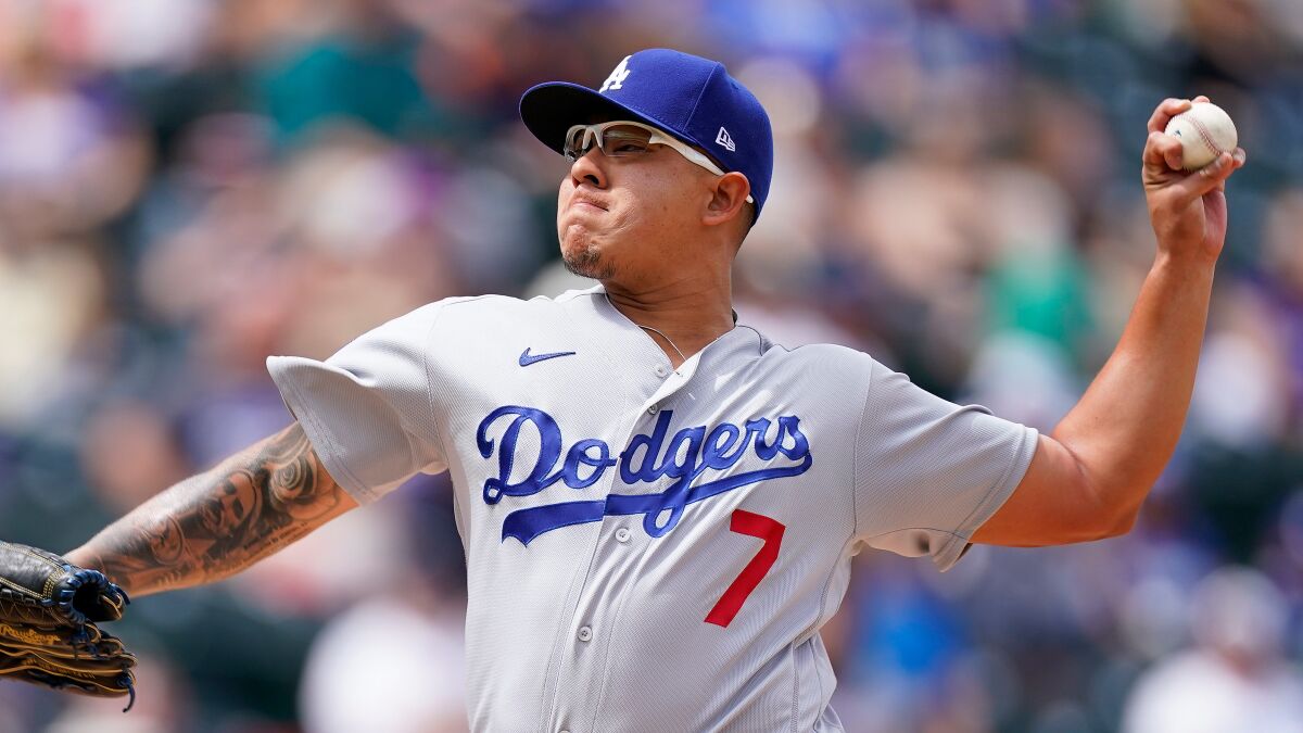 Dodgers starting pitcher Julio Urías delivers against the Colorado Rockies on April 4.