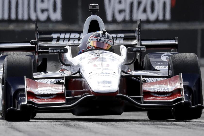 Graham Rahal races during the IndyCar Detroit Grand Prix auto race on Belle Isle, Sunday, June 4, 2017, in Detroit. (AP Photo/Carlos Osorio)