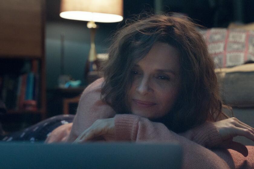 Juliette Binoche in the 2021 drama “Who You Think I Am.” Image courtesy of Cohen Media Group.