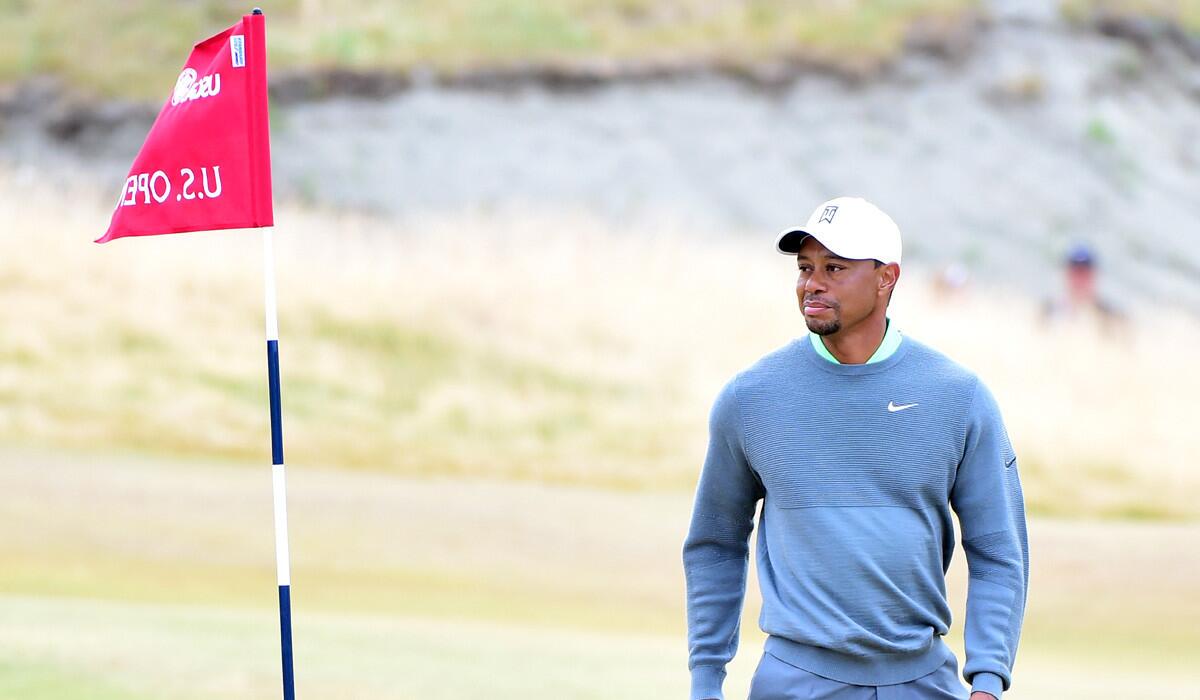 Tiger Woods looks on during a practice round prior to the start of the 115th U.S. Open Championship at Chambers Bay on Tuesday.