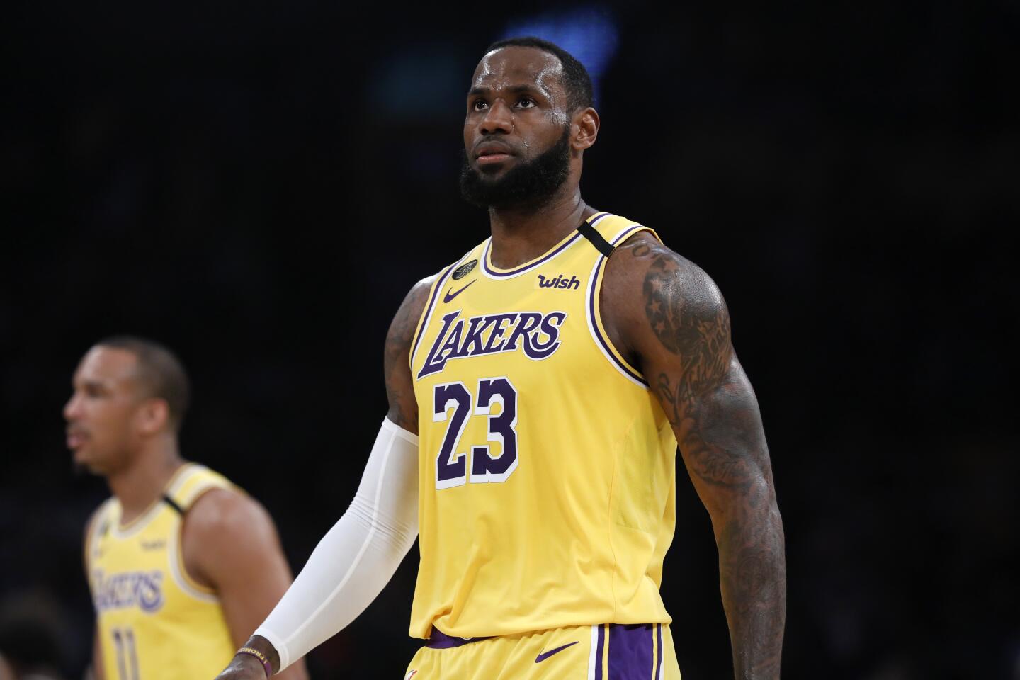 LeBron James looks on during the first half of a game March 6 against the Bucks at Staples Center.