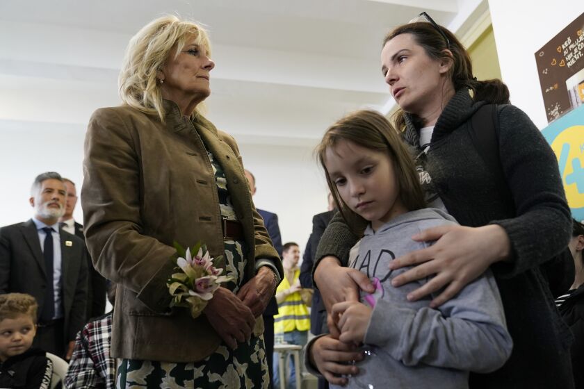First lady Jill Biden talks with Ukrainian refugees Victorie Kutocha and her daughter Yulie Kutocha