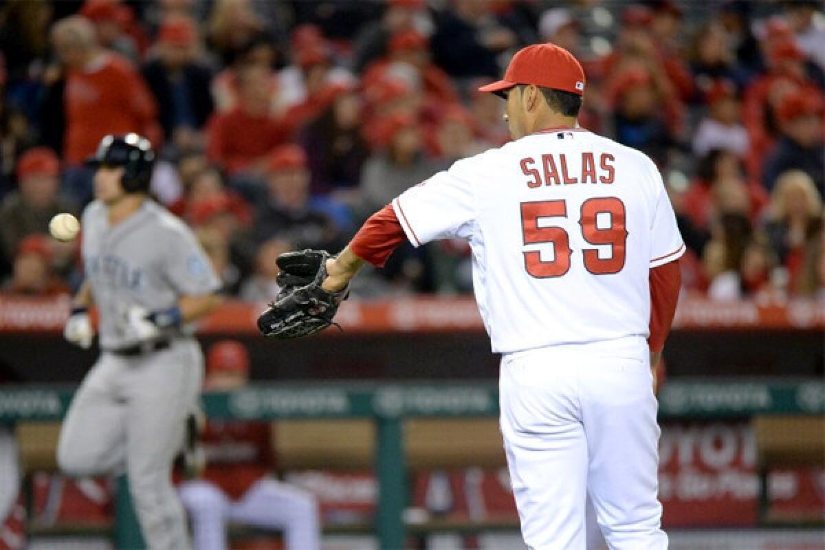 Fernando Salas gave up a three-run home run by Seattle catcher Mike Zunino in the sixth inning. The Angels lost to the Mariners, 8-2.