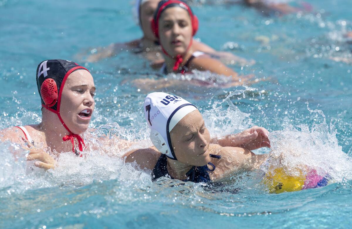 U.S. women's national water polo team's Stephanie Haralabidis battles for a ball.