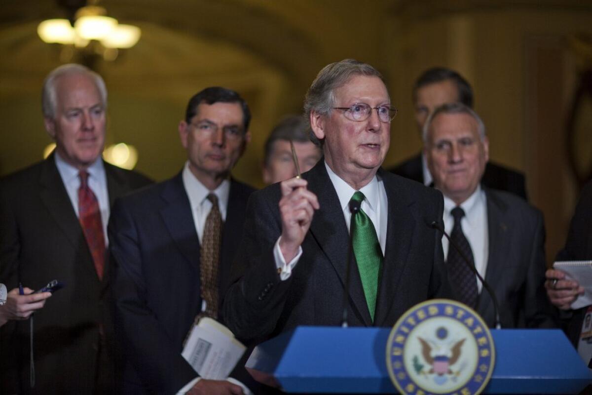 Senate Minority Leader Mitch McConnell speaks about the fiscal cliff in a news conference in Washington on Tuesday.