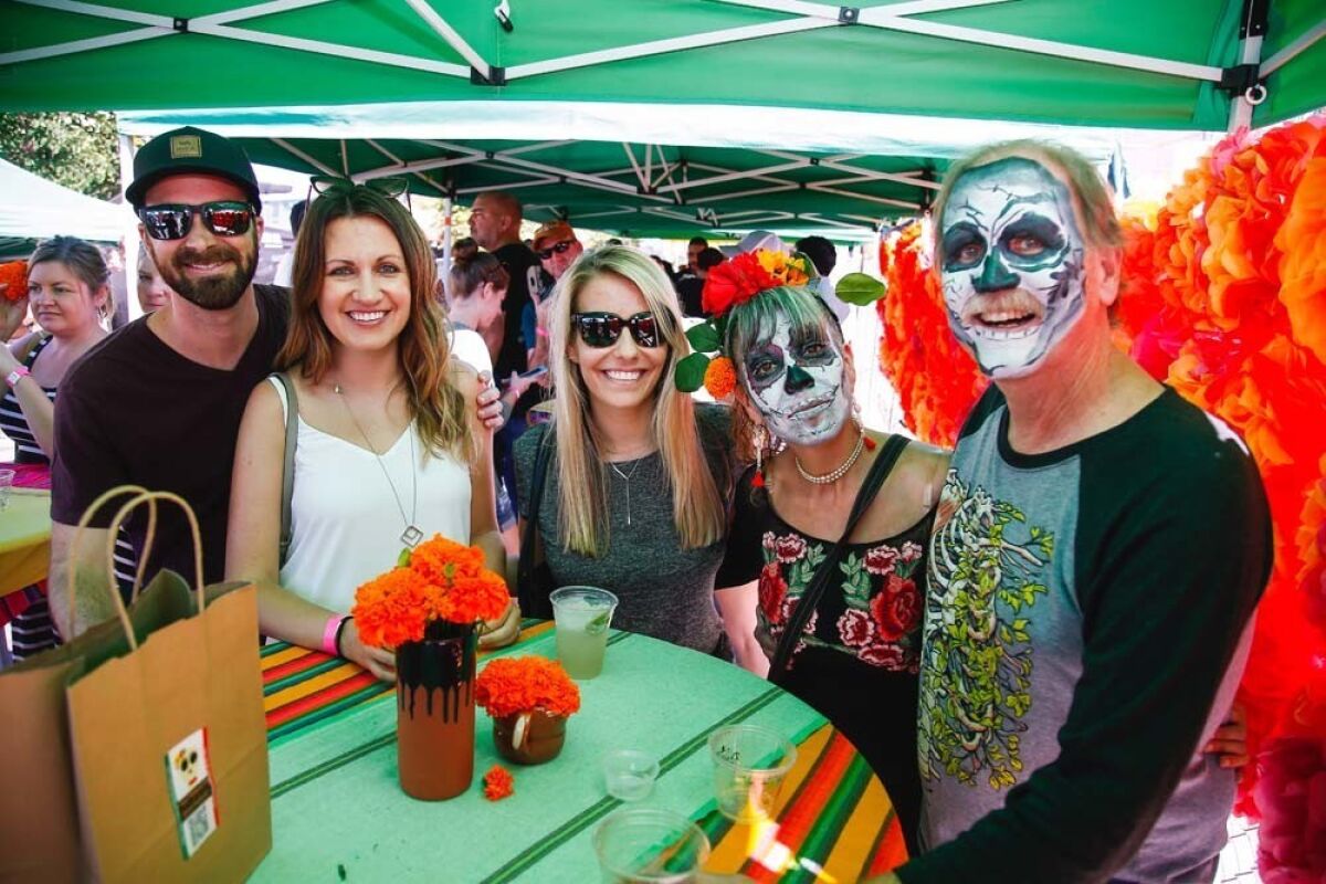 Attendees enjoying Artelexia's Day of the Dead Festival in North Park.